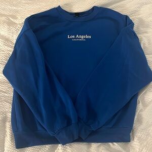 SHEIN blue women’s Los Angeles sweatshirt